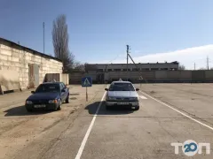 Лого Пріоритет, автошкола